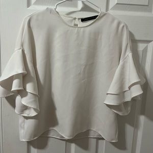 White ruffle sleeve blouse